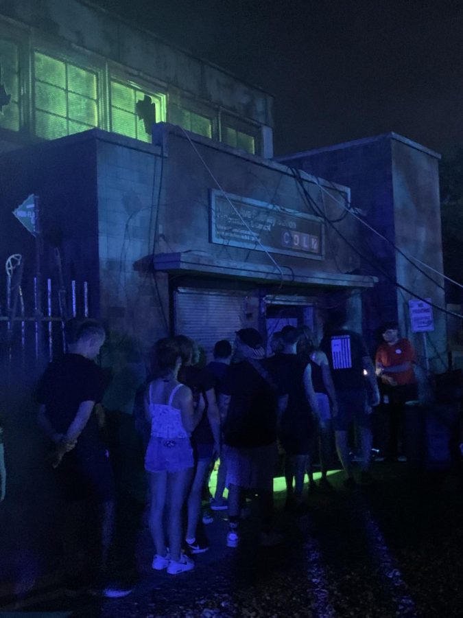 Several brave souls wait to catch the subway for the Descendants of Destruction haunted house. 
