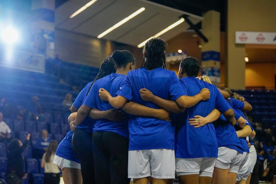 The UNC Asheville Women’s Basketball team huddle before their match against the Converse Cavaliers on Nov 7. 
