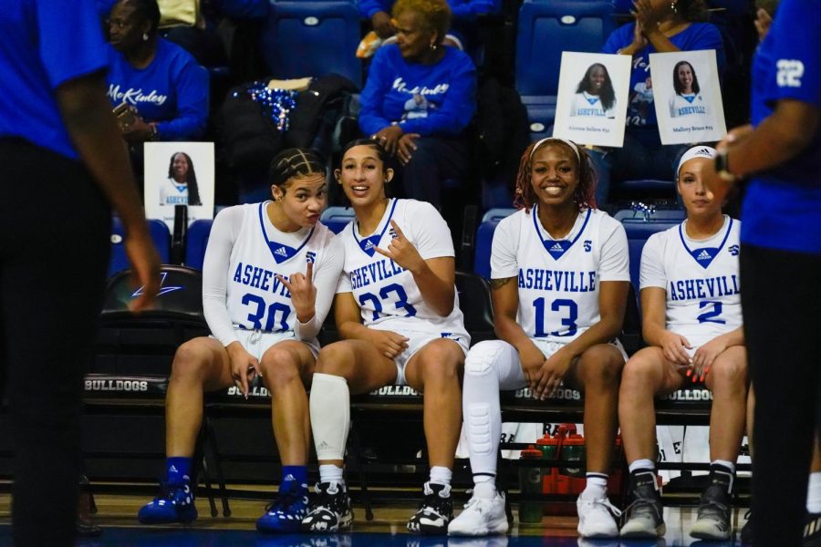 ( from left to right) - Sophomores Jordanyia Ivie and Mallory Bruce sit with Redshirt Junior McKinley Brooks-Sumpter and Senior Faith Adams just before the announcement of starting lineups. 
