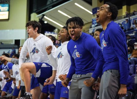 UNC Asheville’s bench celebrates a big play as the Bulldogs take the lead