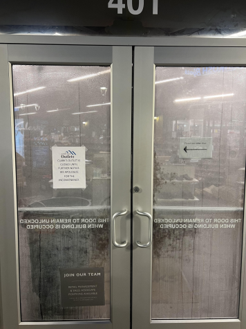 Clarks Outlet is currently closed until further notice per the sign displayed on their condensation filled door. 