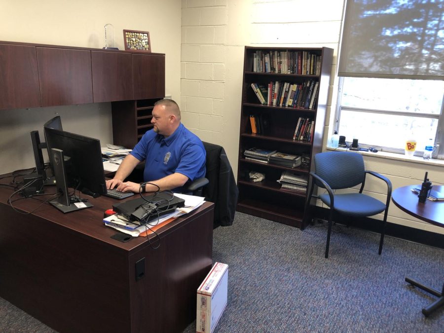 Police Chief Daran Dodd at work in his office.