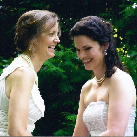 Jennifer Gatti and Stephanie O’Brien laughing on their wedding day.