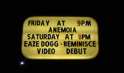 Sign promoting music video for “Reminisce (Good Ol’ Days)” by Eaze Dogg at Sovereign Kava.