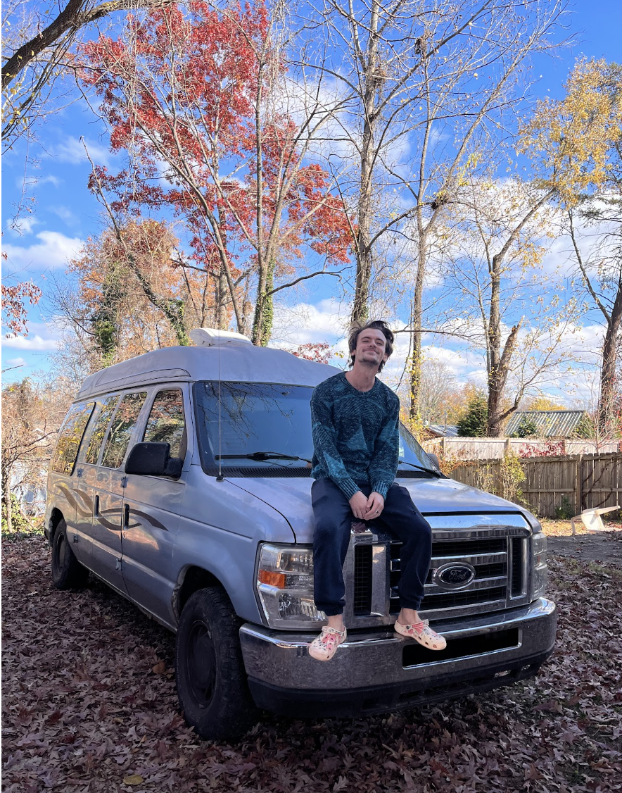 Jacob Eaton posed with his van after renovations in Asheville. 