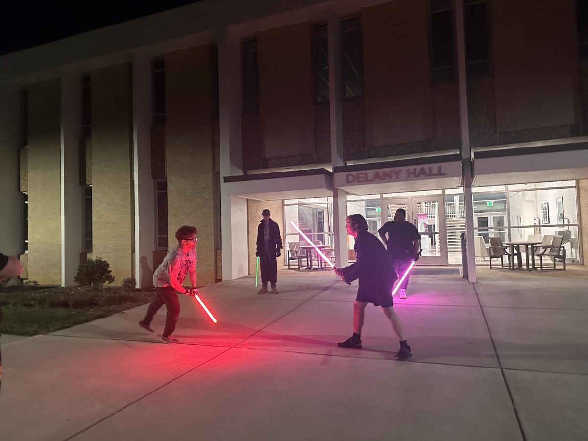 Cooper (left) and Nick (right) duel on AC Reynolds Green on March 28, 2024. 