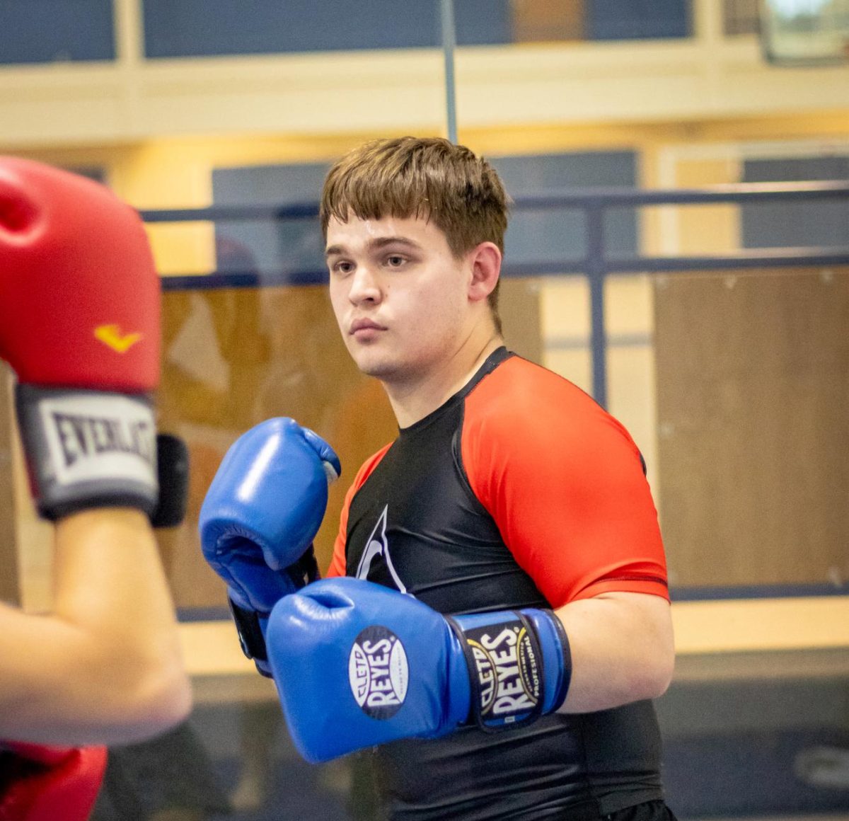 Benjamin Ellis spars during Striking
and Grappling Club.
