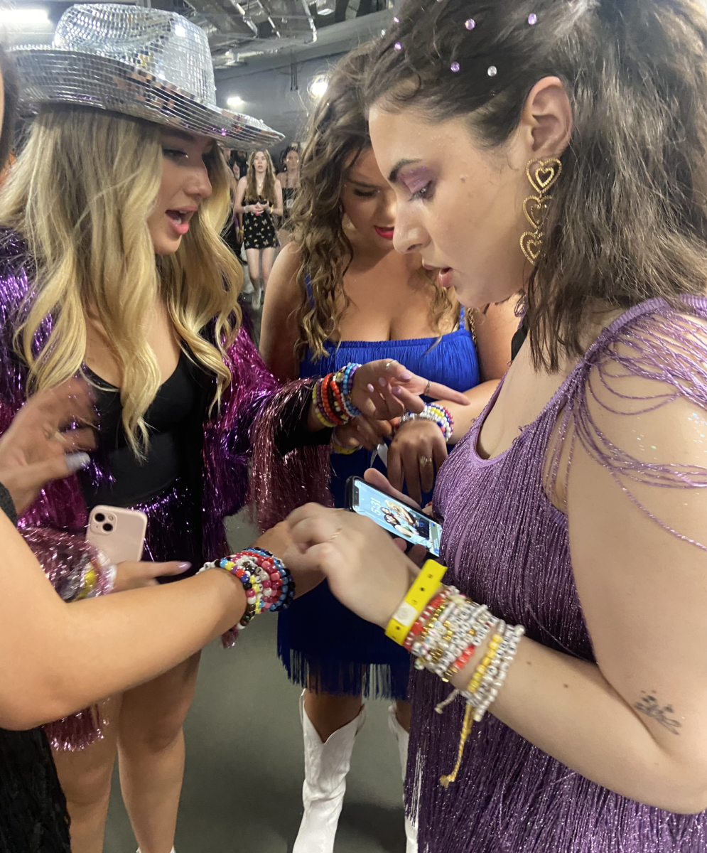 Taylor Swift fans trade friendship bracelets at Atlanta Night 1 of The
Eras Tour.