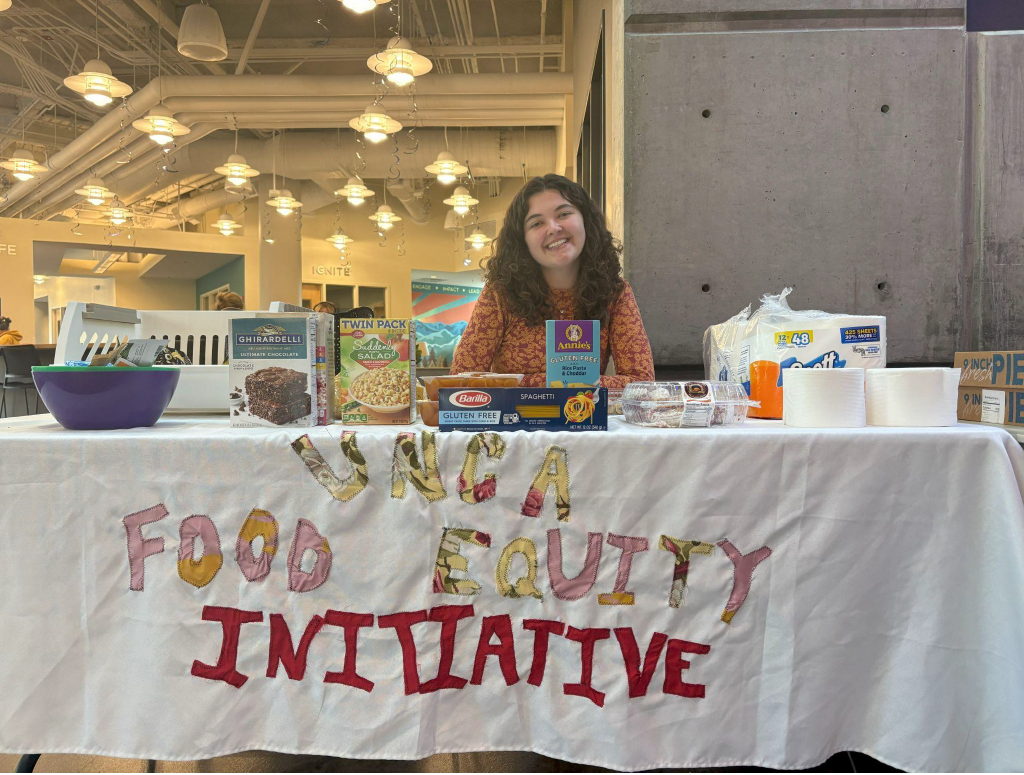 Isabel Killian tables for the Food Equity Initiative in Highsmith Student Union.