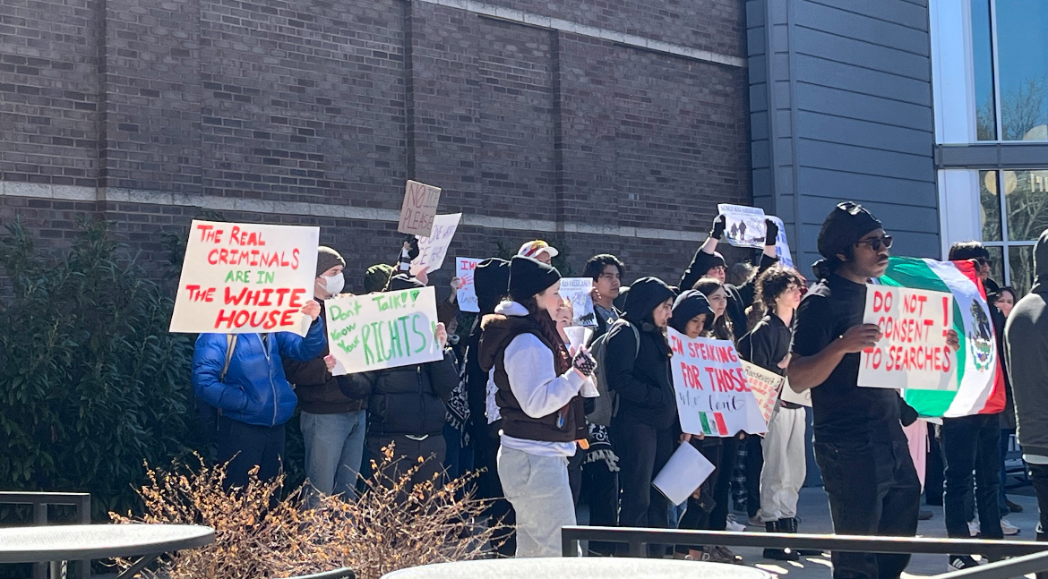 Students protest ICE in front of Highsmith Student Union