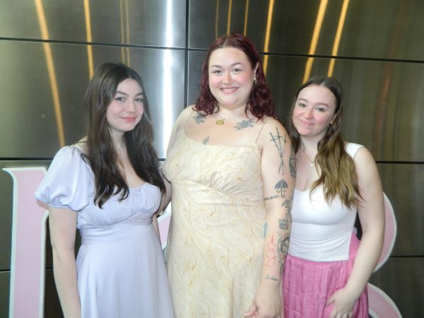(From left to right) Arizona Hall, Sarah Booth and Meghan Kent pose during one of their last Epsilon Psi events at UNC Asheville before graduation.