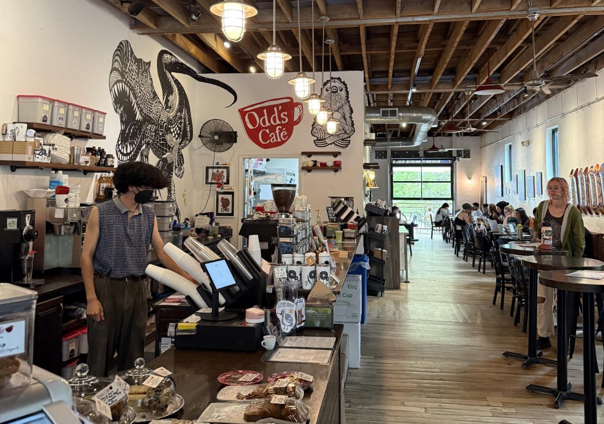 Customers support Local Asheville Business Odd's Cafe on Haywood Street.