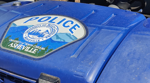 A UNCA campus police decal lays on an agency-owned vehicle.