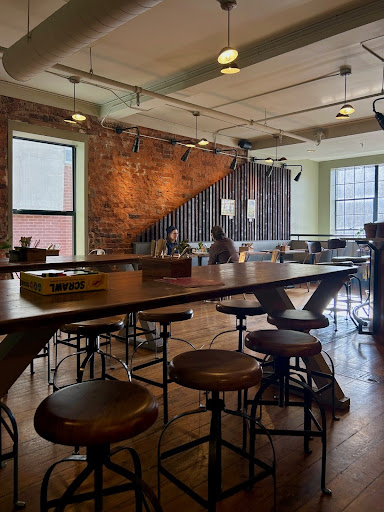 Customers sit in the upstairs seating at The Rhu coffee shop located in downtown Asheville.