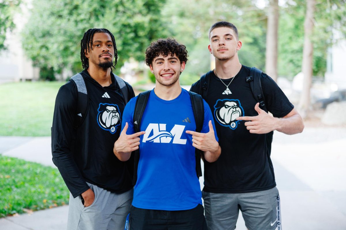 UNC Asheville student basketball athletes DJ Patrick, Hugo Maton, and Brayden Rivers wear new apparel.
