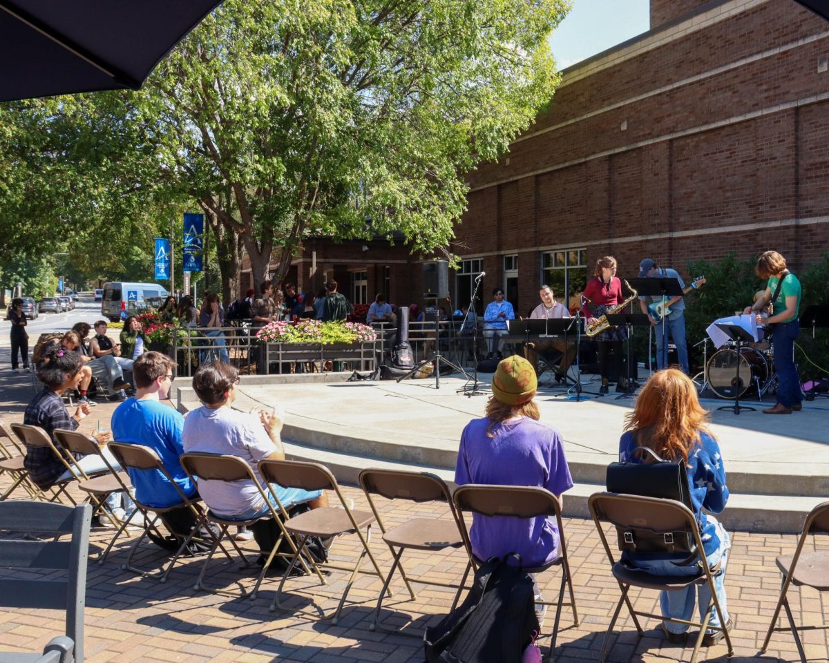 Members of The XTET ensemble perform in front of an audience in Asheville, North Carolina. 