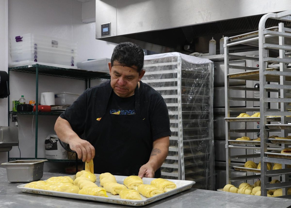 Leon Perez, owner of Don Pastel’s Bakery and Mexican Store, prepares pan dulce in Asheville, North Carolina.