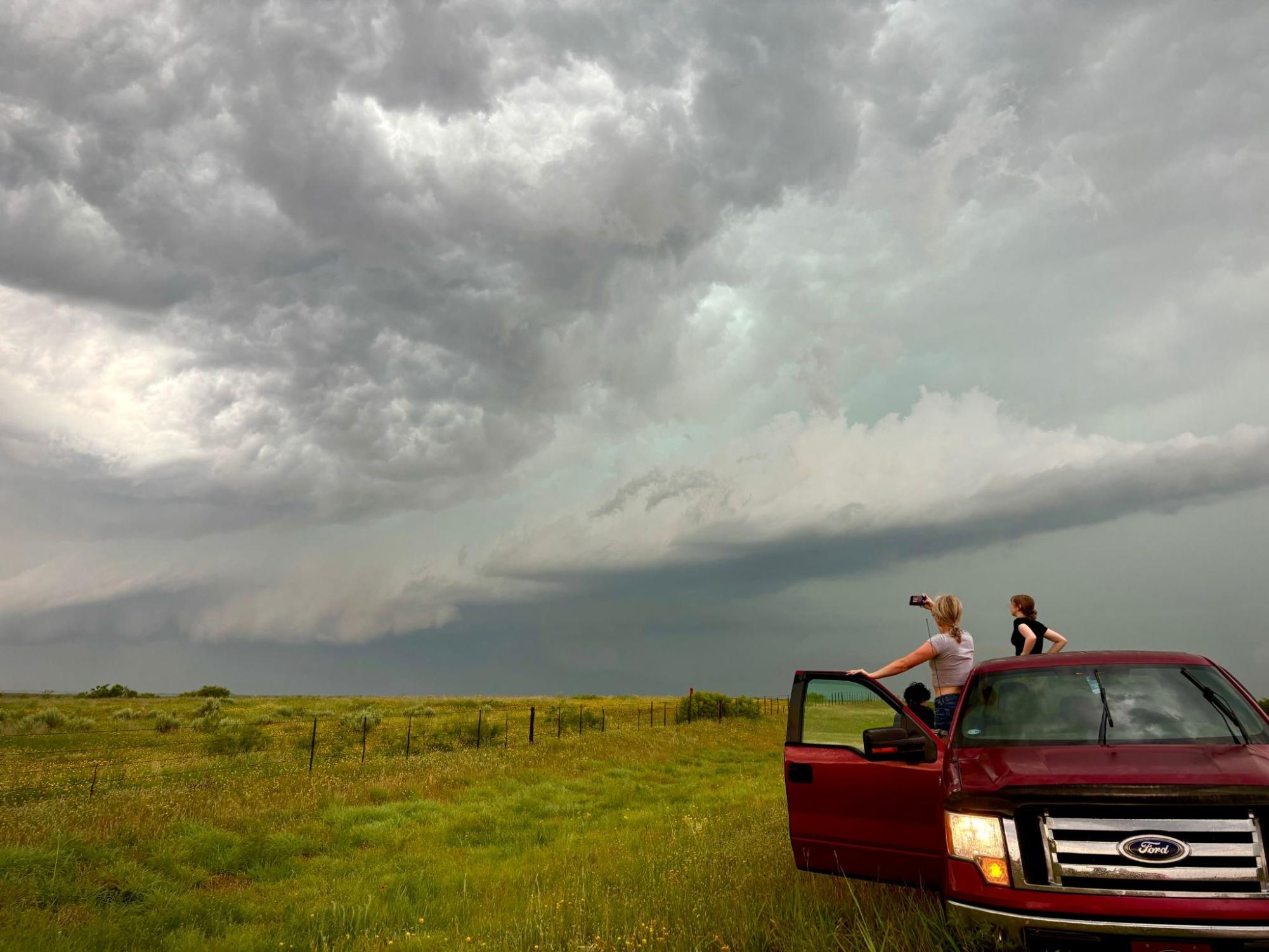 Lexi Dooley and other interns from the National Weather Center chasing storms. 