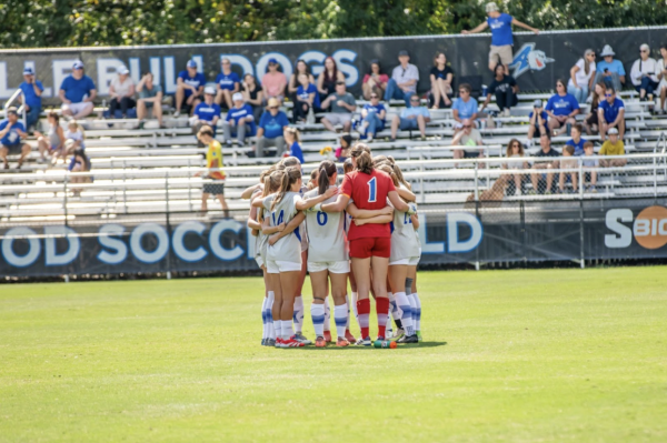 UNC Asheville women’s soccer in a huddle before the start of the match against Davidson. 