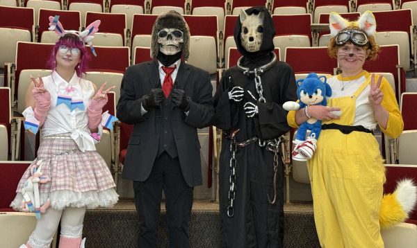 Winner Rae Jones as Sylveon, second place finisher skeleton duo Carter Bopp and Caleb Wyman and third-place Maddy Hayler as Tails after the vote count in Rhoades Robinson Hall.