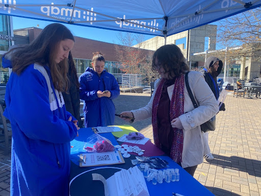 UNCA student completing the questionnaire to join the NMDP registry at Tuesday's tabling event.