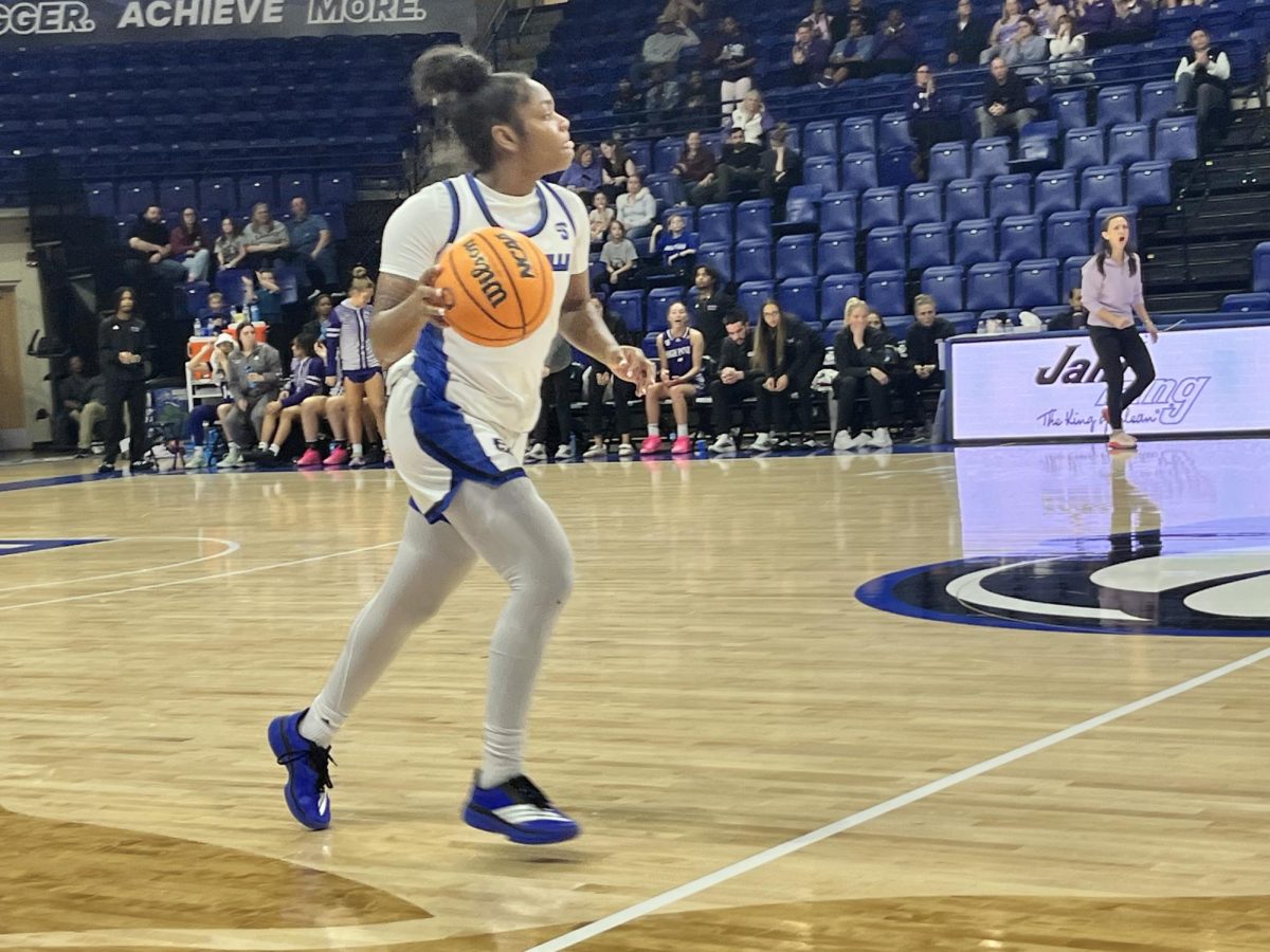 UNC Asheville Women’s Basketball guard Jamaria Freeman bringing the ball up the court against High Point on Feb. 18.