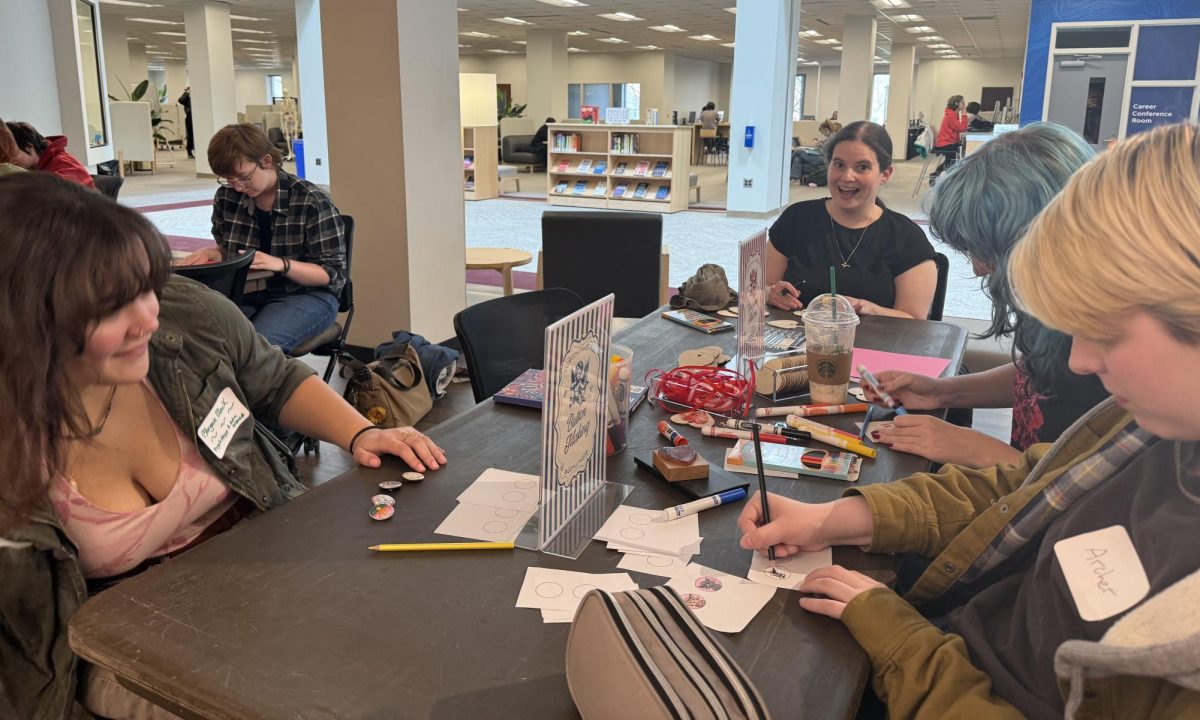 Morgan Black, Kristen Lopez, Marilyn Broadfoot and Archer Kaufman making crafts at the Ramsey Library Pop-Up Valentine Crafty Event.
