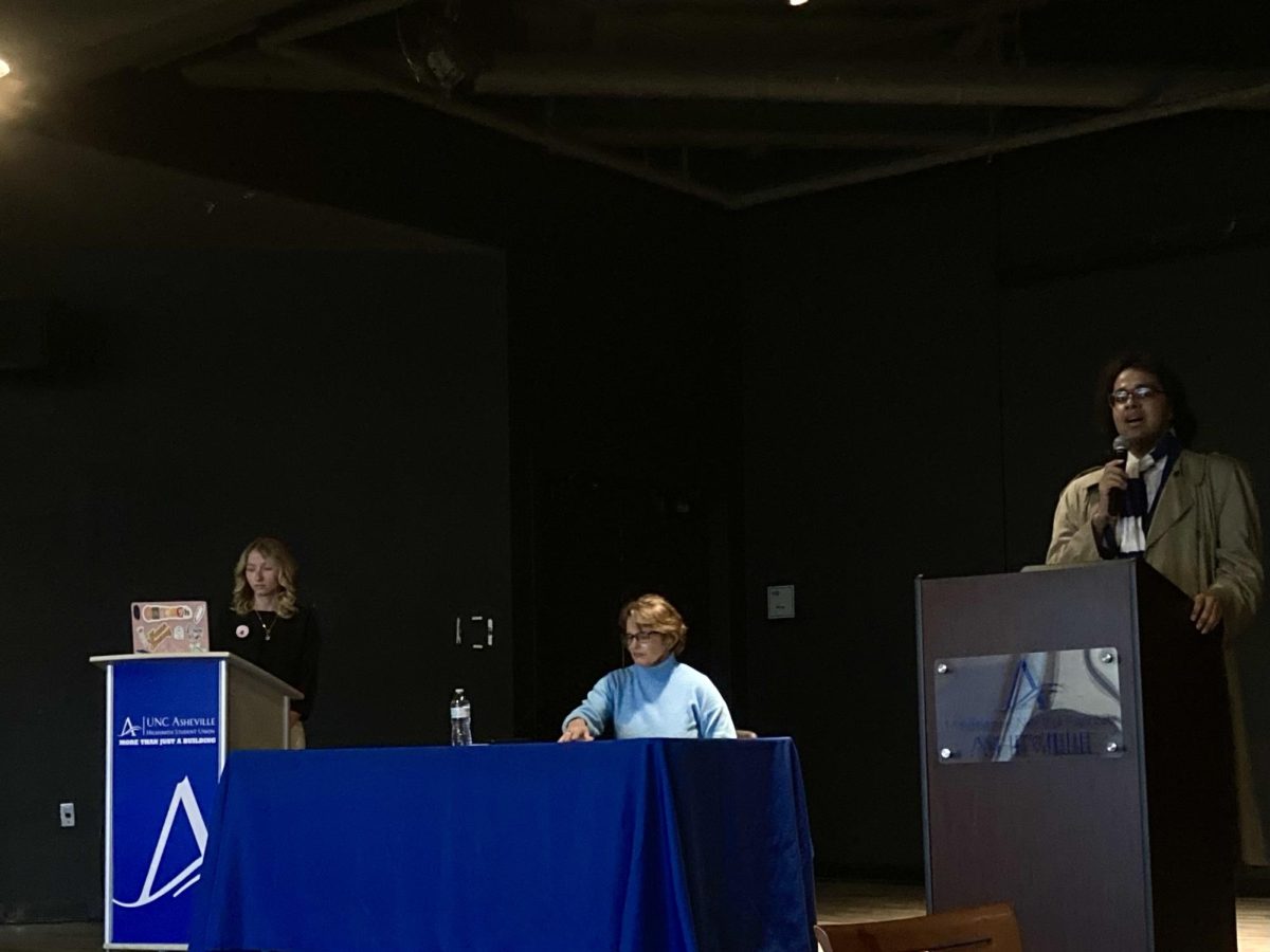 Kaleigh Poteet and Marcos Martinez debating at the Highsmith Student Union. 