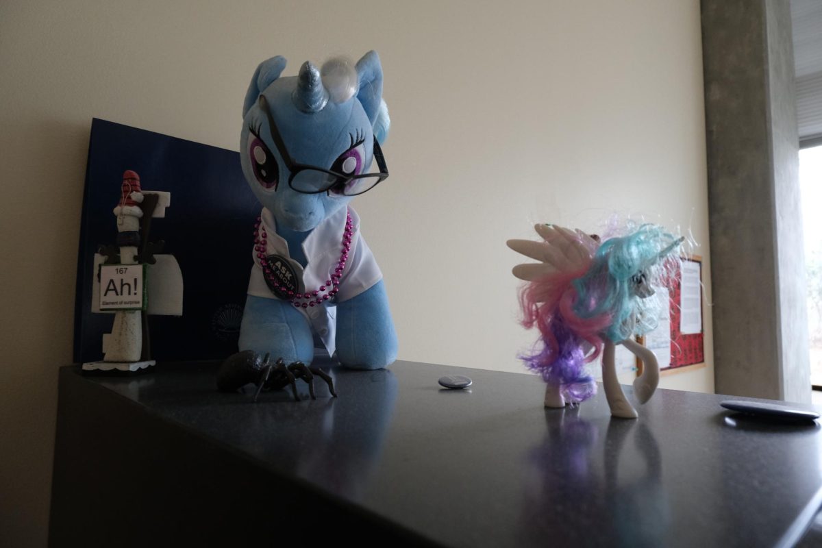 The largest pony stared down on me through its cockeyed glasses.
