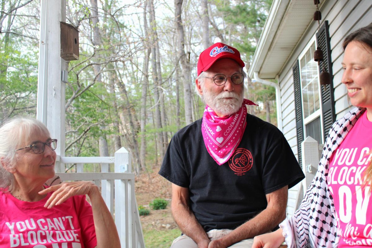 Melody Shank, left, Ken Jones, center, and Nicole Lopez, right, discuss their solidarity trip to Cuba. The three went with the feminist anti-war group CODEPINK contingent of the Nuestras Americas Convoy.