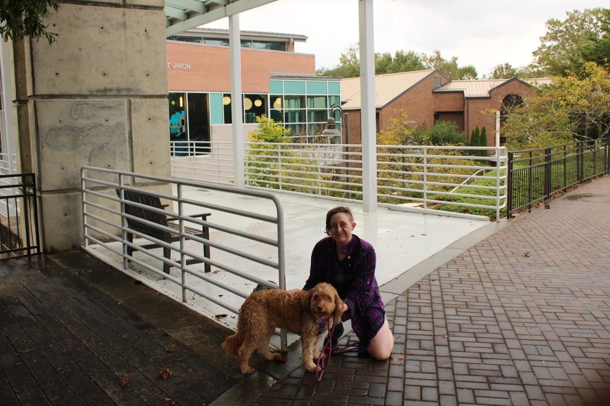 Alex Cooke and Trixie the dog. 