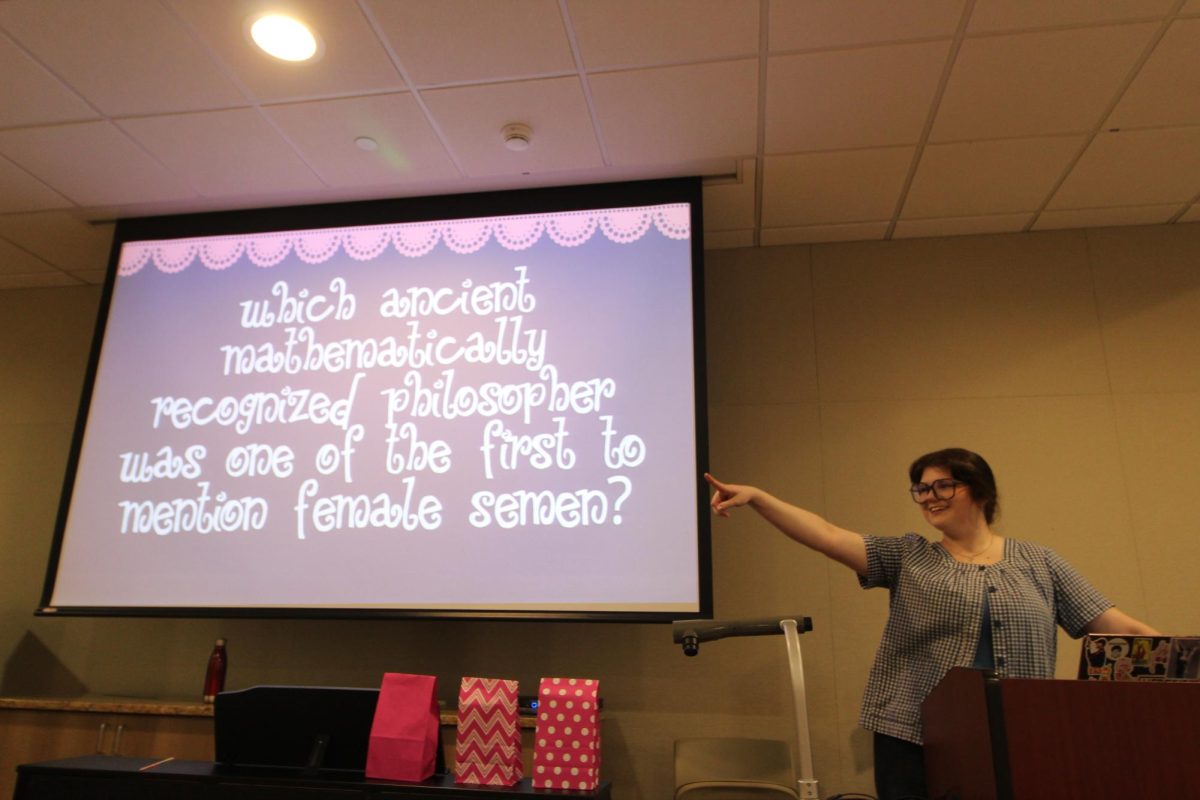 PPGA president Riley Bodo emcees the organization’s trivia night on March 27.