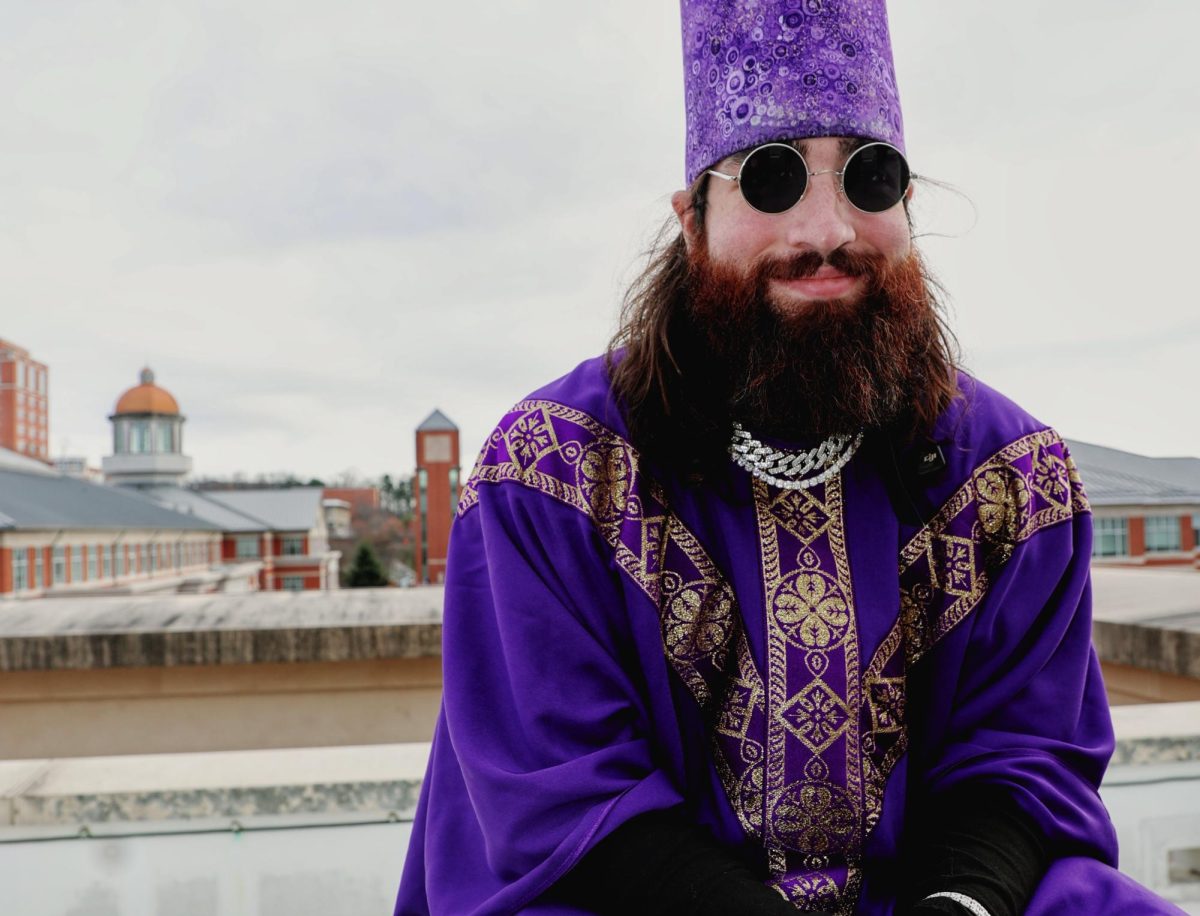 Ruti Buser, 24, poses for a photo in his iconic wizard costume.